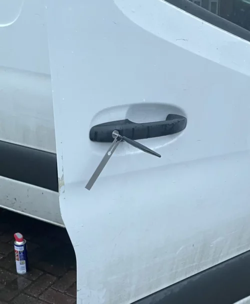 Locksmith opening a van professionally with a dedicated lishi tool