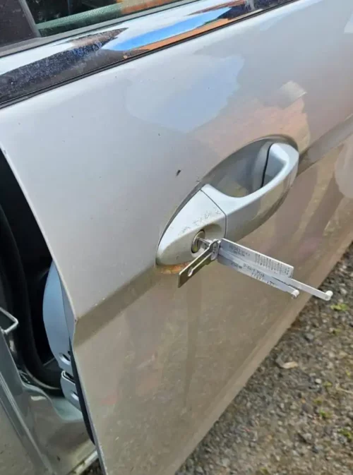Auto locksmith services in Bramley Car door opened professionally using dedicated auto tools