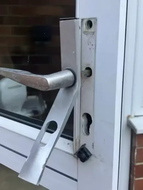 Close-up of a snapped euro cylinder lock after a burglary, requiring an emergency locksmith in Leeds.